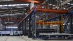 Sistema automatizado de apilado y desapilado de tochos de aluminio