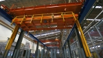 Sistema automatizado de apilado y desapilado de tochos de aluminio